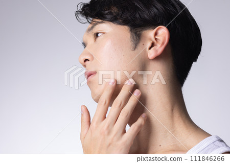 Upper body close-up portrait of a young man with white background Upper body close-up portrait of a young man with white background 111846266