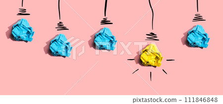 Brainstorming concept with crumpled paper light bulbs Brainstorming concept with crumpled paper light bulbs 111846848