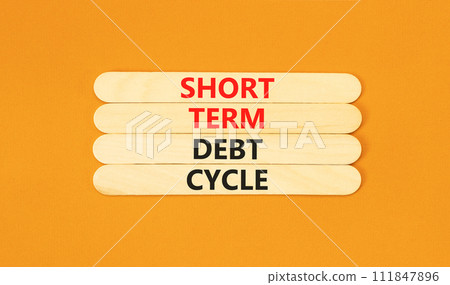 Short term debt cycle symbol. Concept words Short term debt cycle on wooden stick. Beautiful orange table orange background. Business Short term debt cycle concept. Copy space. 111847896
