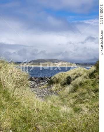 The dunes at Narin Strand, a beautiful large beach in County Donegal Ireland. The dunes at Narin Strand, a beautiful large beach in County Donegal Ireland. 111848068