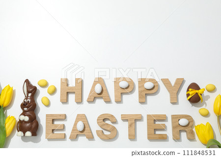 The inscription Happy Easter on a white background 111848531