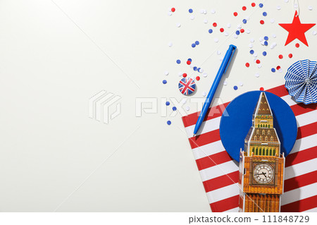 Big Ben with the flag of Great Britain on a light background. 111848729
