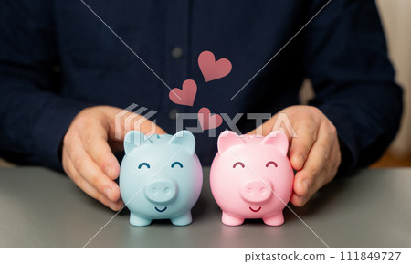 Combining the budget into a family budget. Concept of starting a life together and a shared budget for spending. United banking for young families. State support for demography. Emotional connection Combining the budget into a family budget. Concept of starting a life together and a shared budget for spending. United banking for young families. State support for demography. Emotional connection 111849727