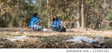 Garbage collect volunteer collect up plastic bottles put garbage at parks avoid pollution be friendly to the environmental and ecosystem 111851161