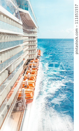 Side view of cruise ship on the blue sky background with copy space, blue tone with motion blur effect 111851557