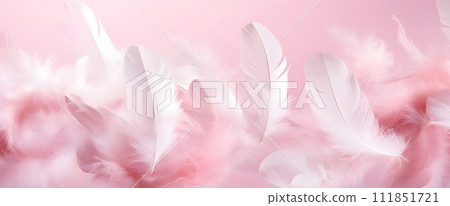 Light airy delicate feathers on a pale pink background. 111851721
