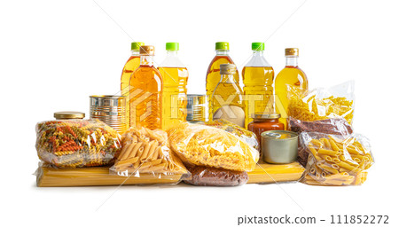 Foodstuff for donation isolated on white background, storage and delivery. Various food, pasta, cooking oil and canned food. 111852272