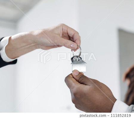 House keys close view. Buying a house background. Real estate concept House keys close view. Buying a house background. Real estate concept 111852819