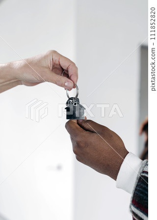 House keys close view. Buying a house background. Real estate concept House keys close view. Buying a house background. Real estate concept 111852820