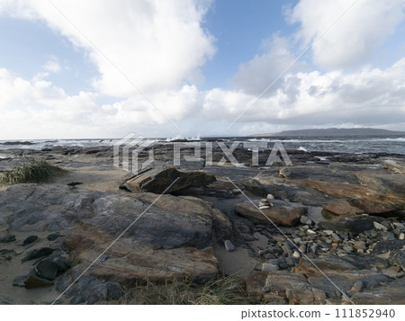 The rocks of Carrickfad by Portnoo at Narin Strand in County Donegal Ireland The rocks of Carrickfad by Portnoo at Narin Strand in County Donegal Ireland 111852940
