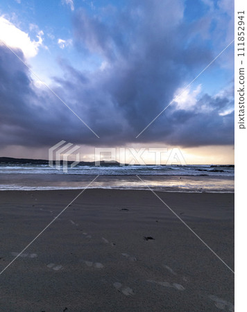 Dramatic clouds at Carrickfad by Portnoo at Narin Strand in County Donegal Ireland Dramatic clouds at Carrickfad by Portnoo at Narin Strand in County Donegal Ireland 111852941
