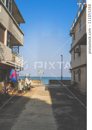 an alley on the island of Peng Chau Jan 6 2024 an alley on the island of Peng Chau Jan 6 2024 111853268