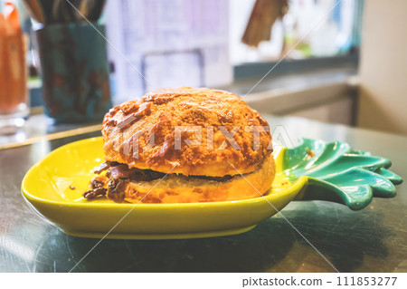 Street Food, pineapple bun with satay beef Jan 6 2024 Street Food, pineapple bun with satay beef Jan 6 2024 111853277