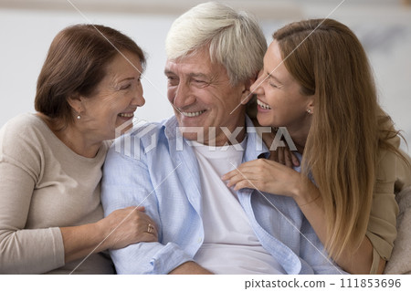 Beautiful happy family spend time together at home Beautiful happy family spend time together at home 111853696