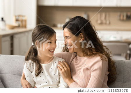 Excited pretty mother and positive little daughter girl having fun 111853978