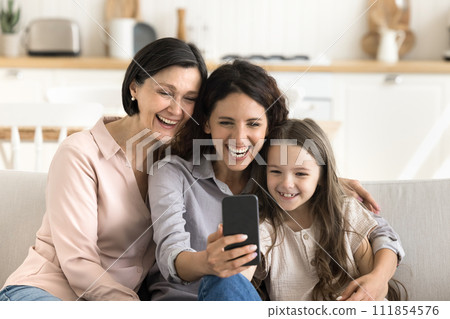 Diverse generation of women using modern smartphone 111854576