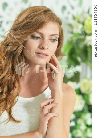 Portrait of beautiful woman posing at home Portrait of beautiful woman posing at home 111854850