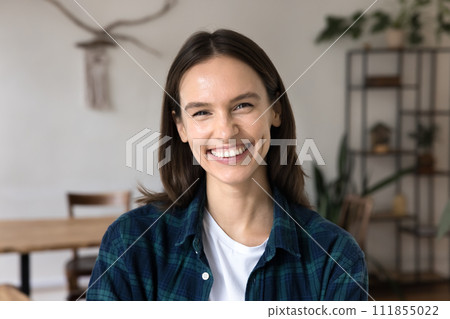 Happy attractive young woman in casual cloth posing in office Happy attractive young woman in casual cloth posing in office 111855022