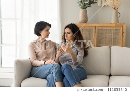 Mature mom and young adult daughter lead trustworthy talk Mature mom and young adult daughter lead trustworthy talk 111855840