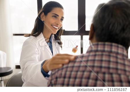 Positive geriatric medical therapist woman seeing older grey haired patient Positive geriatric medical therapist woman seeing older grey haired patient 111856287