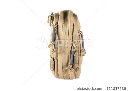 Backpack bag gear protective color khaki, tactical sports equipment isolated on white background Backpack bag gear protective color khaki, tactical sports equipment isolated on white background 111857386