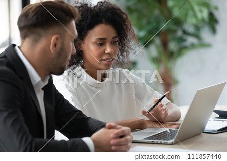 Business expert helping entrepreneur in modern office Business expert helping entrepreneur in modern office 111857440