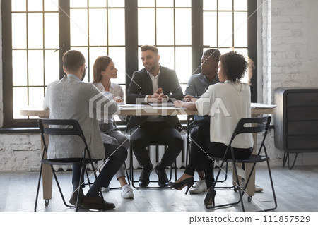 Young office workers having a meeting with director 111857529