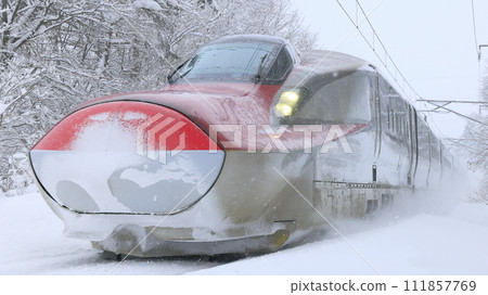 Akita Shinkansen running through the snowy Sengan Pass Akita Shinkansen running through the snowy Sengan Pass 111857769