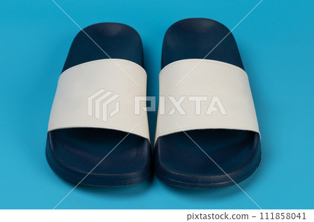 Front view of colorful flip flops 111858041