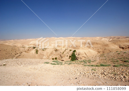 Picturesque mountain landscape of the Judean Desert near Qumran, Israel 111858099