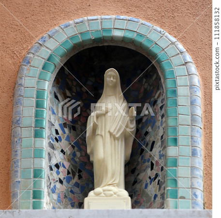 Manarola Italy, Liguria, Cinque Terre, a religious chantry with a Madonna statue in one of the streets of the center Manarola Italy, Liguria, Cinque Terre, a religious chantry with a Madonna statue in one of the streets of the center 111858132