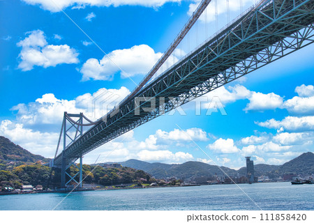 Looking up at Kanmon Bridge from below 111858420