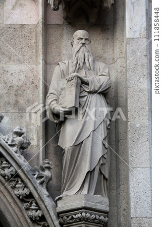 Statue of Saint, Votivkirche (The Votive Church) in Vienna, Austria 111858448