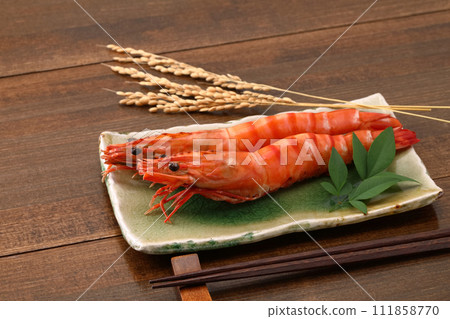 Grilled large shrimp on a plate 111858770