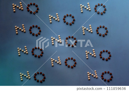 Wallpaper using blocks randomly arranged diagonally with the word NO spelled out. Wallpaper using blocks randomly arranged diagonally with the word NO spelled out. 111859636