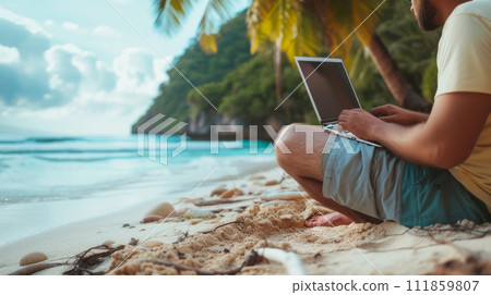 Man Working on Laptop at Tropical Beach 111859807