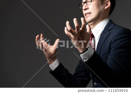 Businessman with a surprised expression Businessman with a surprised expression 111859910