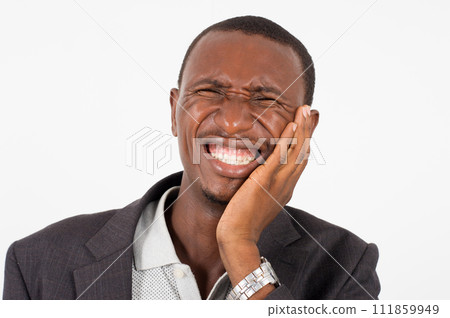 young man in suit standing on white background, suffering. 111859949