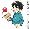 Boy playing kendama 111860420