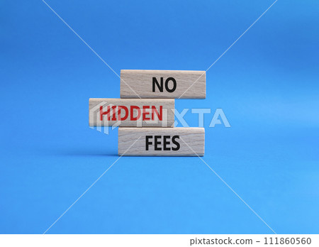 No hidden fees symbol. Concept word No hidden fees on wooden blocks. Beautiful blue background. Business and No hidden fees concept. Copy space 111860560