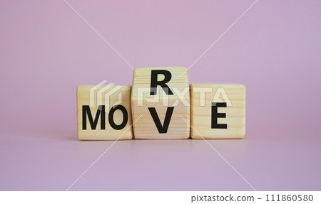 More Move symbol. Wooden cubes with words More Move. Beautiful pink background. Business concept and More Move. Copy space More Move symbol. Wooden cubes with words More Move. Beautiful pink background. Business concept and More Move. Copy space 111860580