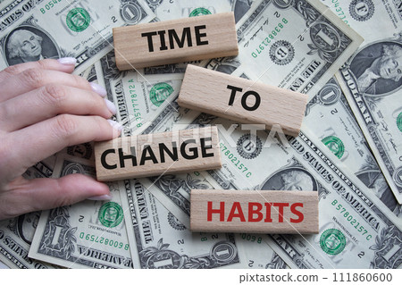 Time to Change Habits symbol. Wooden blocks with words Time to Change Habits. Beautiful dollar background. Psychologist hand. Psychology and Time to Change Habits concept. Copy space. 111860600
