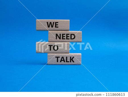 We need to talk symbol. Concept words We need to talk on wooden blocks. Beautiful blue background. Business and We need to talk concept. Copy space. We need to talk symbol. Concept words We need to talk on wooden blocks. Beautiful blue background. Business and We need to talk concept. Copy space. 111860613