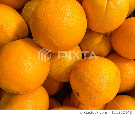 Lots of ripe juicy oranges top view. Lots of ripe juicy oranges top view. 111862148