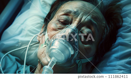 Male patient wearing an oxygen mask Male patient wearing an oxygen mask 111862411