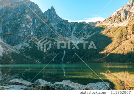Tatra National Park in Poland. Famous mountains lake Morskie oko or sea eye lake In High Tatras. Five lakes valley Tatra National Park in Poland. Famous mountains lake Morskie oko or sea eye lake In High Tatras. Five lakes valley 111862907