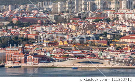 Museu de Arte, Arquitetura and Tecnolocia or MAAT at the Rio Tejo in Belem near museum of electricity aerial timelapse. Lisbon, Portugal 111863713