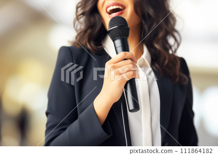 AI-generated content. Motivational female speaker with microphone speaking on stage 111864182