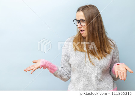 Surprised Woman in Glasses and Sweater 111865315