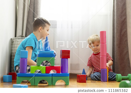 Creative Playtime Children with Colorful Building Blocks 111865382